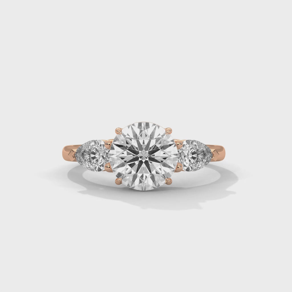 Three Stone Diamond Engagement Ring in 14K Rose Gold, 1.50 Carat Round Lab Grown Diamond with Pear Side Stones
