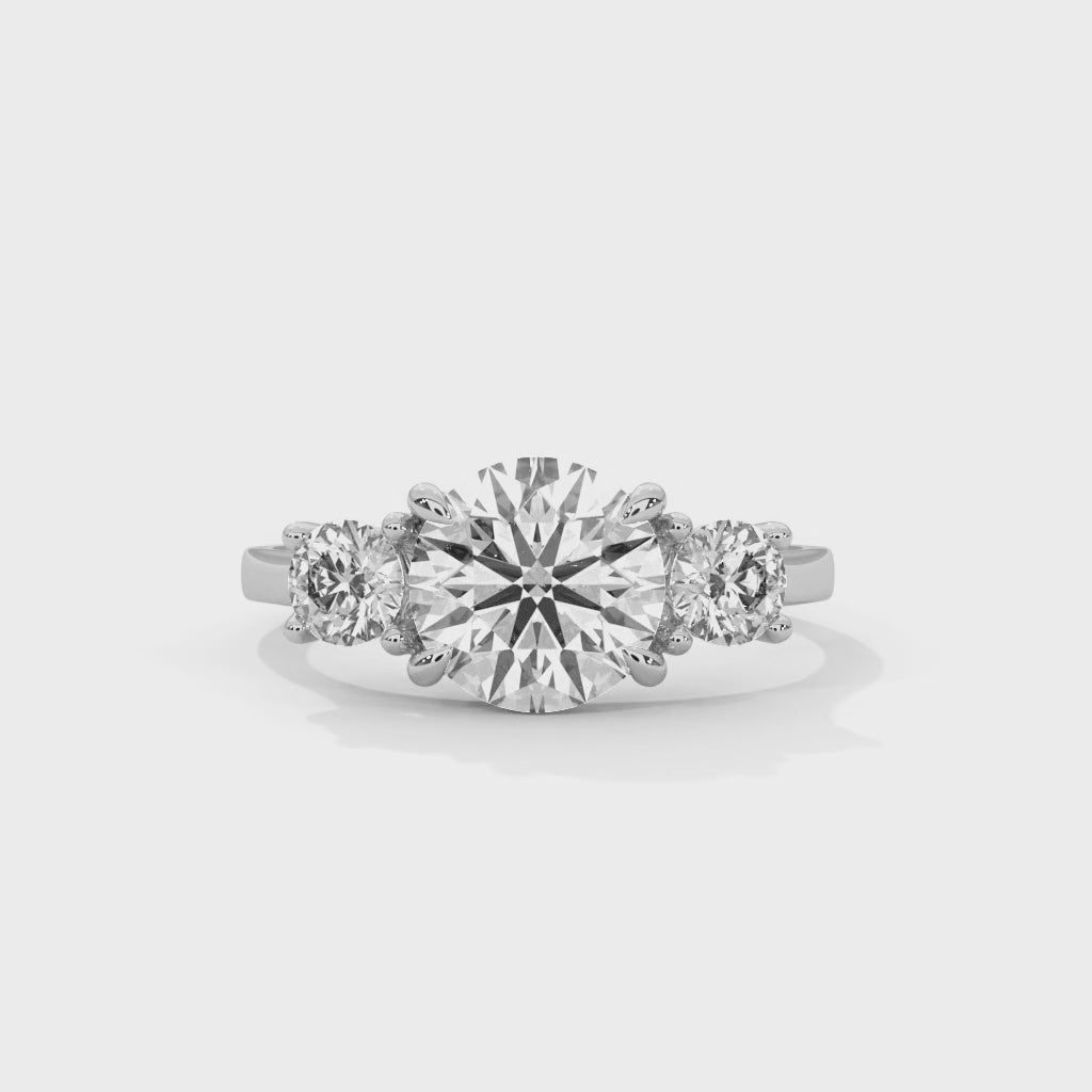 Three Stone Round Diamond Engagement Ring in White Gold – Classic Trilogy Diamond Ring with Side Stones