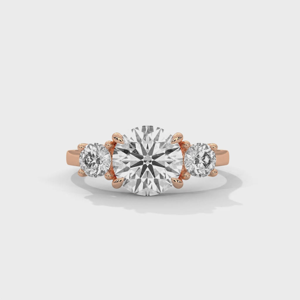 Three Stone Round Diamond Engagement Ring in Rose Gold – Classic Trilogy Diamond Ring with Side Stones
